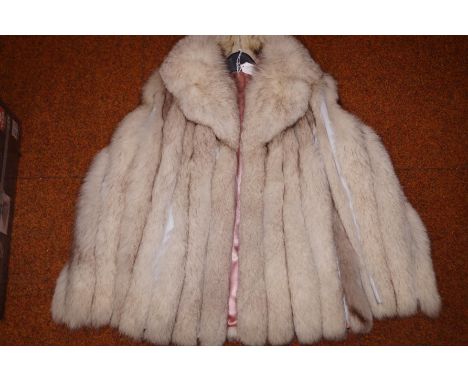 Vintage blue fox fur coat receipt from 1980's costing £500.00