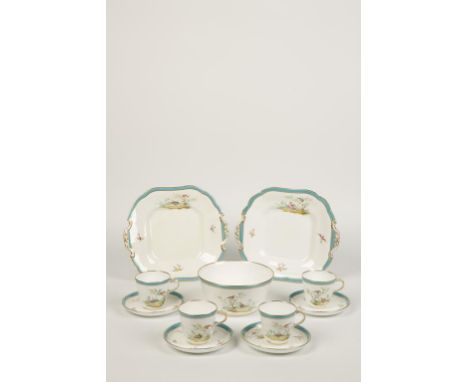 A VICTORIAN PORCELAIN TEA SERVICE polychrome painted with "birds in flight" and "birds in branches" decoration, within turquo