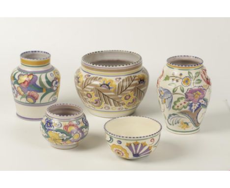 A POOLE POTTERY CARTER STABLER ADAMS JARDINIÈRE of red body, shape no. 923, decorated in the DX pattern by Marian Jones, a tr