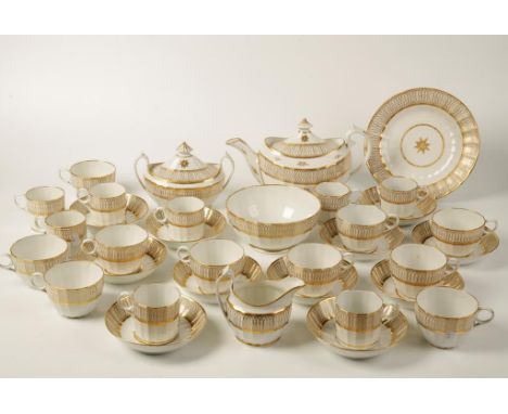 A EARLY 19TH CENTURY WORCESTER TEA AND COFFEE SERVICE, with gilt decoration on a white glazed ground. Comprising: Teapot, mil