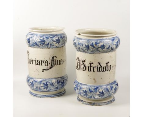 A LARGE PAIR OF ITALIAN BLUE AND WHITE APOTHECARIES ALBARELLO each labelled within blue foliate scroll bands, one 'I HPRIARA 