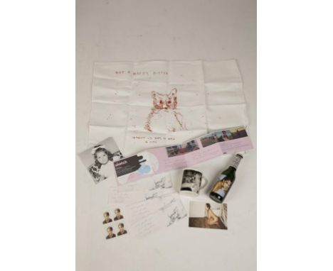 •TRACEY EMIN (b.1963) A collectable tea towel "Not a Happy Kitten" a Tracey Emin Beck's beer bottle, four Oyster card wallets