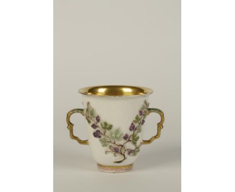 A BERTGHA MEISSEN PORCELAIN CUP with raised vine decoration, circa 1720, with later Hausmaler polychrome decoration, 3.5" hig