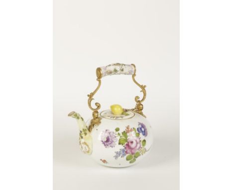 A DRESDEN PORCELAIN TEAPOT of globular form, painted in coloured enamels with floral decoration and ormolu mounts with a hing