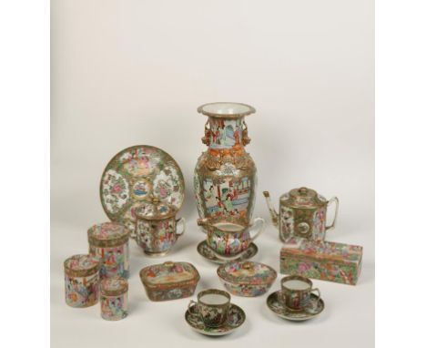 A CHINESE FAMILLE ROSE PART TEA SERVICE, each piece painted with panels of figures reserved on a solid gilt ground, enriched 