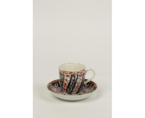 A WORCESTER PORCELAIN CUP AND SAUCER decorated in the Queen Charlotte pattern, underglaze blue faux Chinese seal marks, 18th 