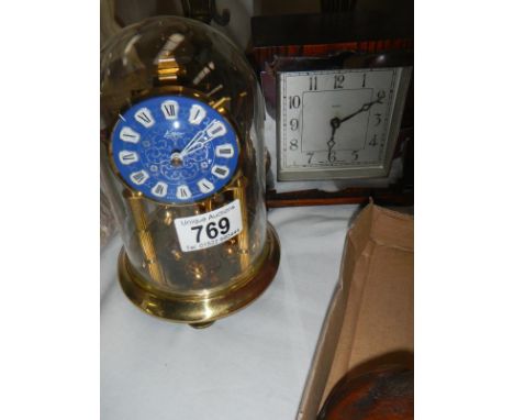 An anniversary clock and one other clock