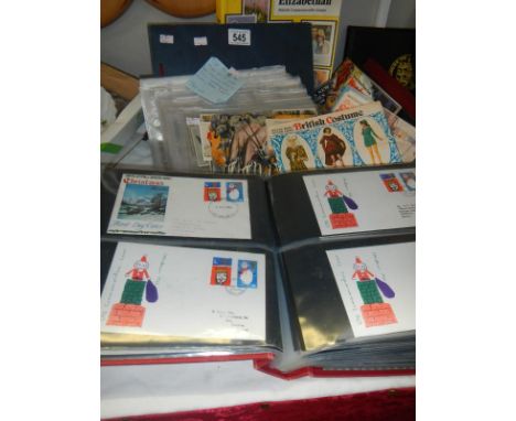 A mixed lot of stamps and cigarette cards including First Day Covers, Commemorative, Players, J Wix etc