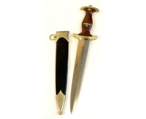 A German Third Reich NSKK Dagger, the double edge steel blade etched Alles fur Deutschland to one side, the opposing side  wi