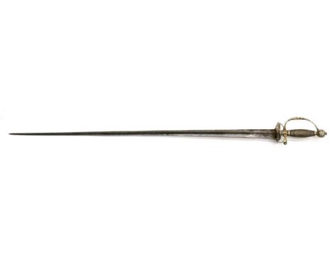 An Early 18th Century Small Sword, with 78cm concave triangular section steel blade, the silver hilt with double shell guard,