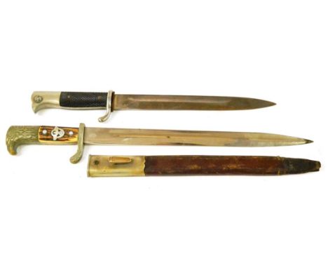 A German Third Reich Police Dress Dagger, the 33cm steel blade by E & F Horster, Solingen, the nickel plated brass hilt with 