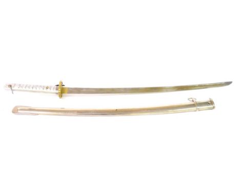 A Japanese Second World War Shin Gunto NCO's Sword, the 68cm  fullered steel blade stamped 40558, with brass habaki, brass ts