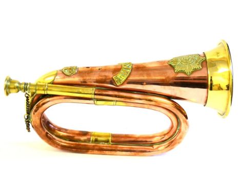 A Brass and Copper Military Bugle, with applied badges and title to the Hampshire Regiment,