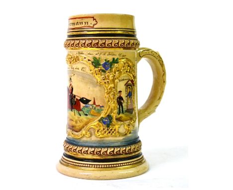 A Prussian Cream Pottery Beerstein, the rim inscribed `Res. Hermann', the main body moulded with a cartouche and painted with