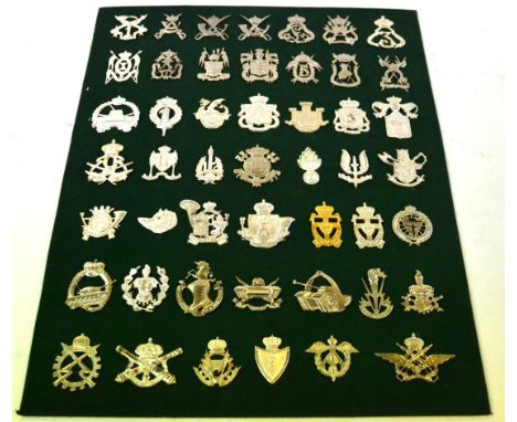 A Collection of Forty Eight Post Second World War Belgian Army Cap Badges, all in white metal except one gilt example, compri