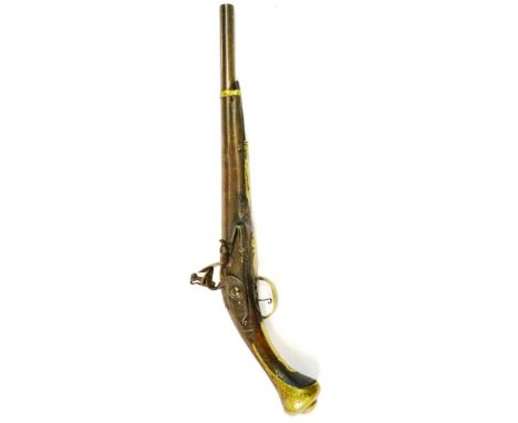 An 18th Century Continental Flintlock Holster Pistol,  the 32cm steel barrel octagonal at the breech, the top flat inlaid wit