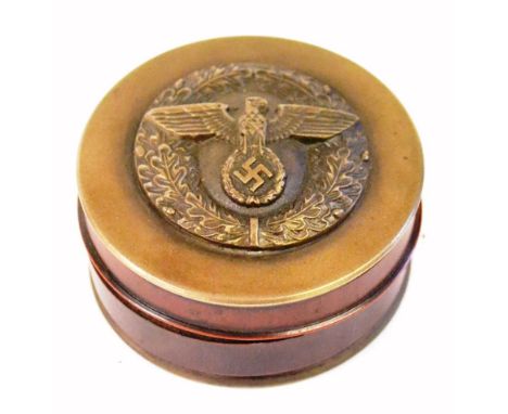 A Copy of a German Third Reich Brass and Composition Snuff Box, of compressed cylindrical form, the screw on cover set with a