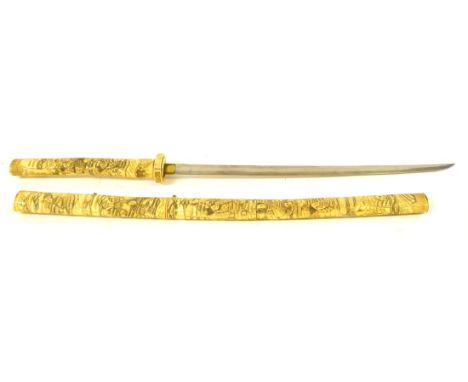 A Japanese Bone Mounted Wakizashi, the 47cm single edge steel blade with delamination marks and brass habaki, the hilt and sc