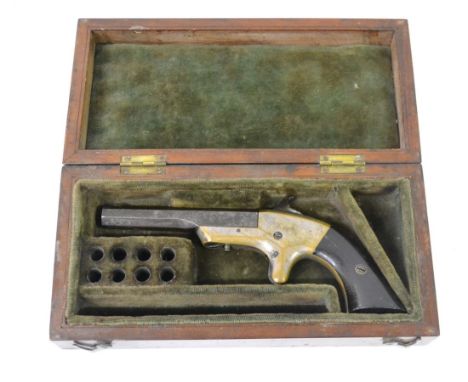 A 19th Century American Single Shot Rimfire Deringer, the 9cm octagonal steel barrel swivelling sideways for loading, the bra