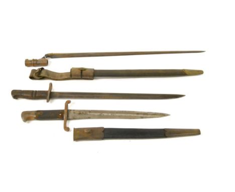 A French Model 1866 Chassepot Yataghan Sword Bayonet, the blade stamped CHRISTOFLE to the ricasso, the steel crossguard and s