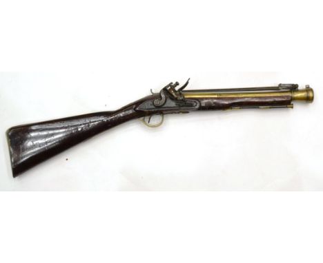 An 18th Century Flintlock Blunderbuss by Jno. Mann, the 37cm brass cannon barrel octagonal at the breech, with London proof m