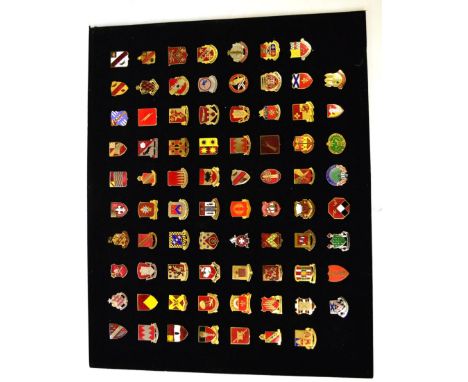 A Collection of Seventy Eight Distinctive Insignia Badges of the US Army Artillery Units, in enamelled gilt and white metal, 