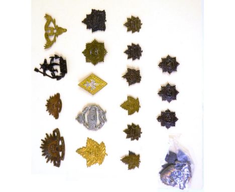 A Collection of Twenty Cap and Collar Badges, in brass, bi-metal and white metal, comprising two Australian Commonwealth Mili