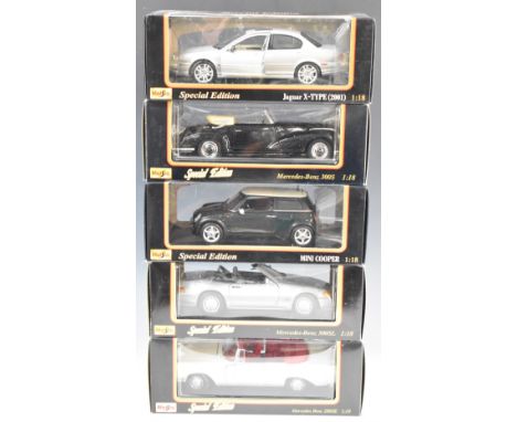 Five Maisto 1:18 scale diecast model cars to include Mercedes-Benz 500SL, Mini Cooper and Jaguar X-Type (2001), all in origin