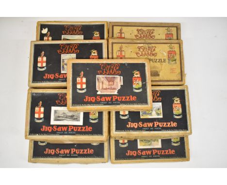 Eleven Chad Valley GWR jigsaw puzzles comprising Anne Hathaway's Cottage, Fingal Bridge, St. David's Cathedral, Glorious Devo