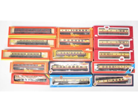 Fifteen 00 gauge Hornby, Bachmann and other passenger carriages to include LNER, LMS, BR and GWR, all in original boxes.