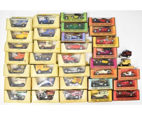 Thirty-five Matchbox Models of Yesteryear diecast model cars to include 1912 Ford Model T Y-12, 1920 Rolls Royce Fire Engine 