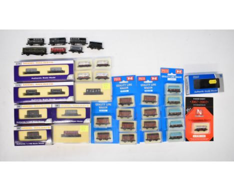 Thirty-six Dapol, Peco and Bachmann N gauge model railway wagons, most in original boxes.
