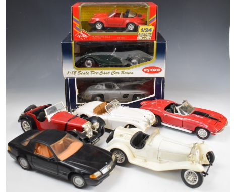 Eight 1:18 and 1:24 scale Burago, Ertl and similar diecast model cars, 3 in original boxes.