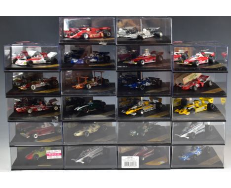 Twenty-two Quartzo 1:43 scale diecast model Formula 1 racing cars to include Copper Climax T51 Jack Brabham 4099, Tyrrel 001 