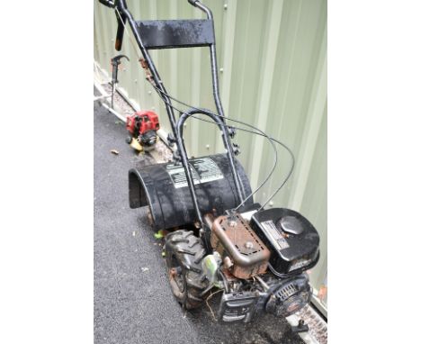 Garden rotavator with petrol engine