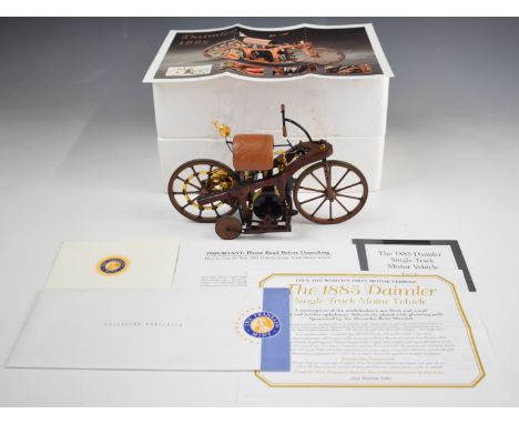 Franklin Mint 1:8 scale diecast model Daimler Single Track Motor Vehicle 1885, in original box with related paperwork.