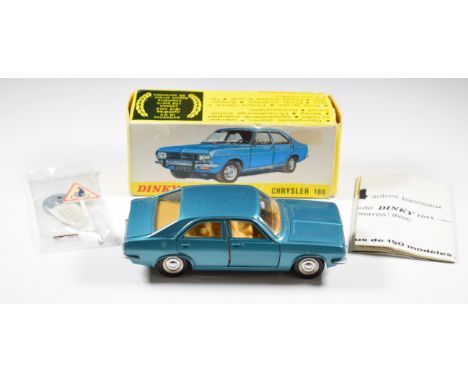 Dinky Toys diecast model Chrysler 180 with blue body and beige interior, 1409, in original box with road sign and paperwork.&
