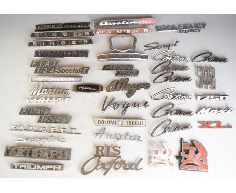 Large collection of car badges including multiple (Ford) Cortina, Allegro, Vanguard, Jaguar, Hillman, Wolseley, Triumph, Peug