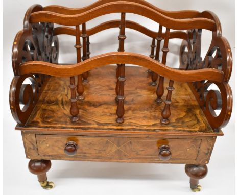 19th/20thC inlaid walnut and mahogany Canterbury with fretwork fleur de lys ends, raised on bulbous legs and ceramic castors,
