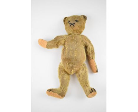 Steiff Teddy bear 1920's or 30's with golden mohair, black glass eyes, button in ear, shaved snout and brown stitched nose an