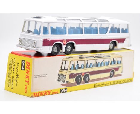 Dinky Toys diecast model Vega Major Luxury Coach with white and purple body, blue interior, silver hubs and jewelled headligh