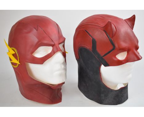 Two Marvel and DC latex adult sized masks comprising Daredevil and The Flash, both with mannequin display heads