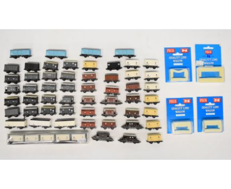 Fifty-nine Peco GWR, SR, LNER and LMS N gauge model railway wagons and break vans, some in original boxes. 