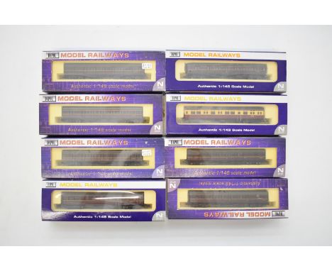 Eight Dapol BR N gauge model railway auto coaches, all in original boxes.