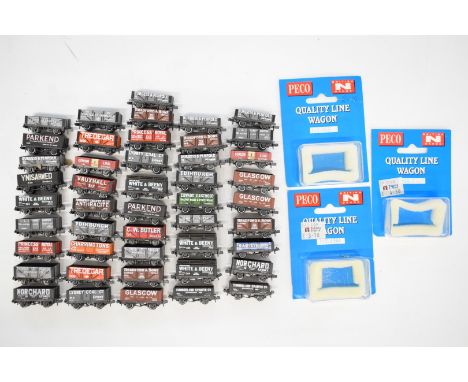 Forty-six Peco N gauge model railway private owner wagons, some in original boxes.