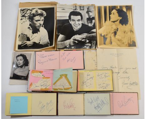 A collection of autograph books and signed pictures including pop stars, actors, DJs and sports stars, autographs include the