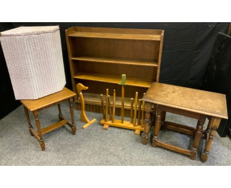 A oak stool, rectangular top, turned  legs, 47cm high, 43cm wide;  an oak four shelf bookcase;; linen basket;  nest of two ta