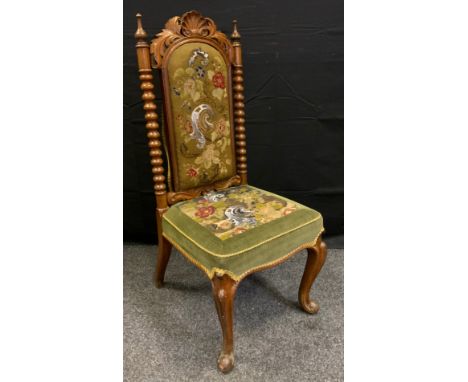 A Victorian walnut side chair, anthemion cresting, arched beaded and tapestry back and stuffed-over seat, turned free standin