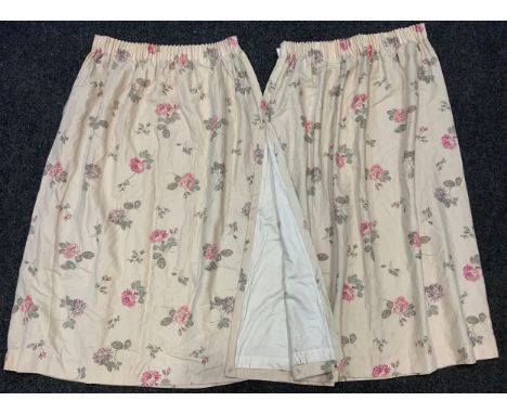 A pair of Laura Ashley floral design curtains, each curtain measuring 153cm long x 254cm wide. 