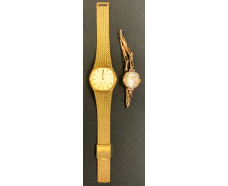 A Tissot Stylist quartz wristwatch, integral bracelet, boxed with instructions;  a ladies 9ct gold cased bracelet watch, expa